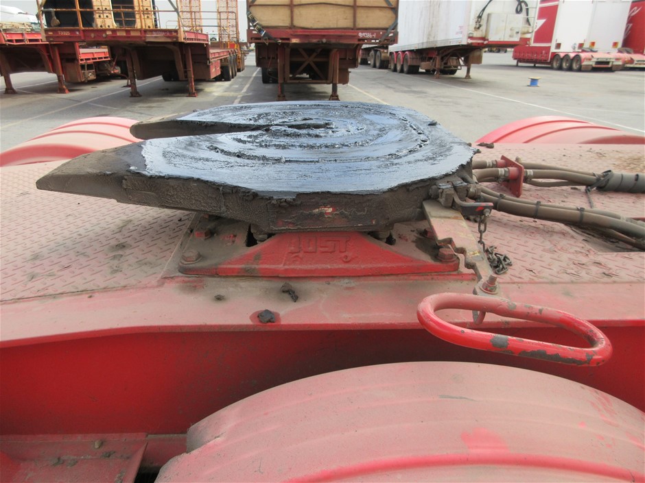 Rash Vest Made With Water Reactive Fabric Showing Dolphin Print When Wet