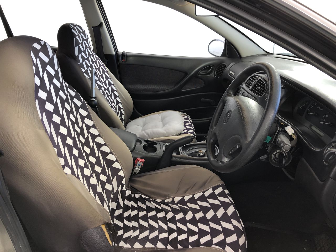 Approx 37 Ct of Loose Boulder Opal Chips (Coober Peby) In glass disp/bottle