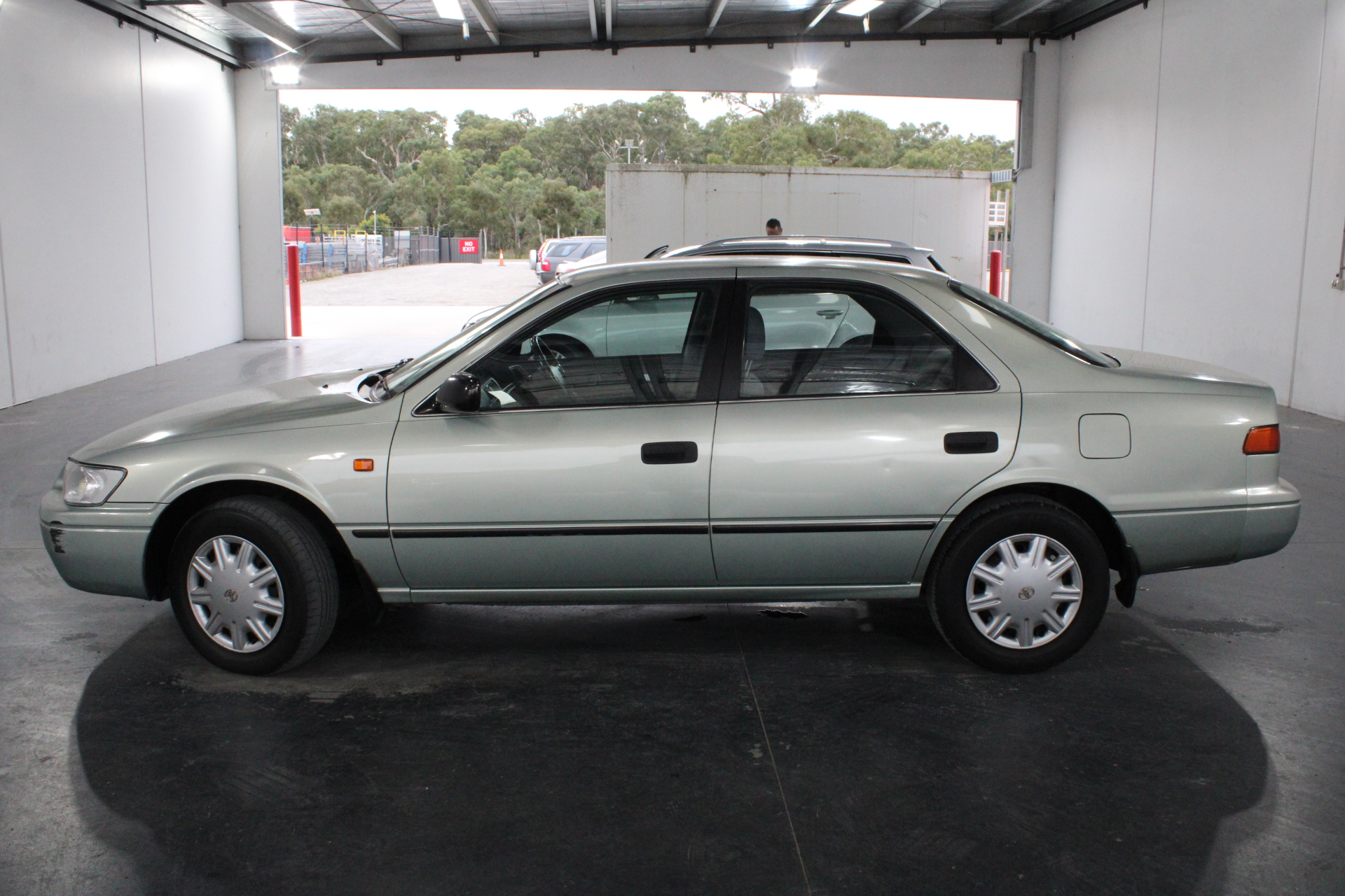 Designer Green & Simulated Diamond Square Stud Earrings in Silver