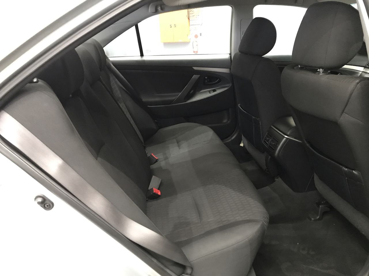 Designer Simulated Diamond Round Black Drop Earrings in Gold