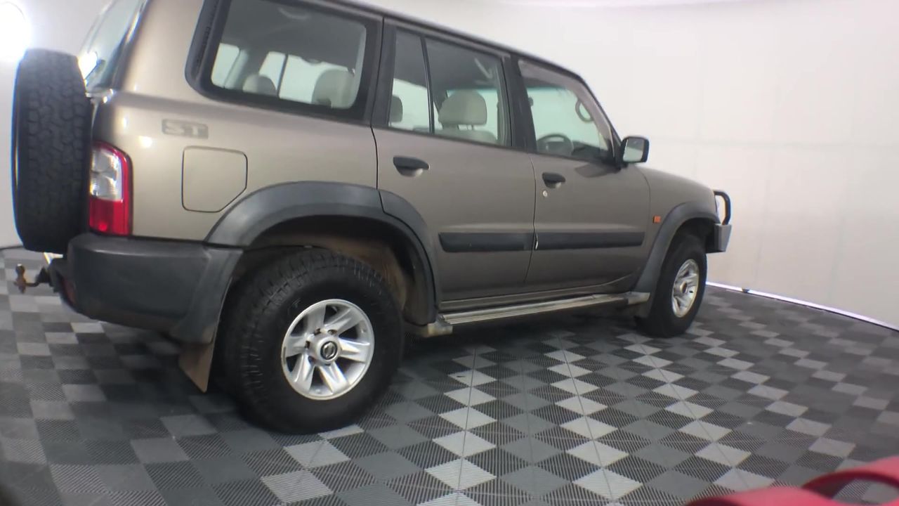 Rhodium Plated Simulated Ruby Filigree Heart Locket