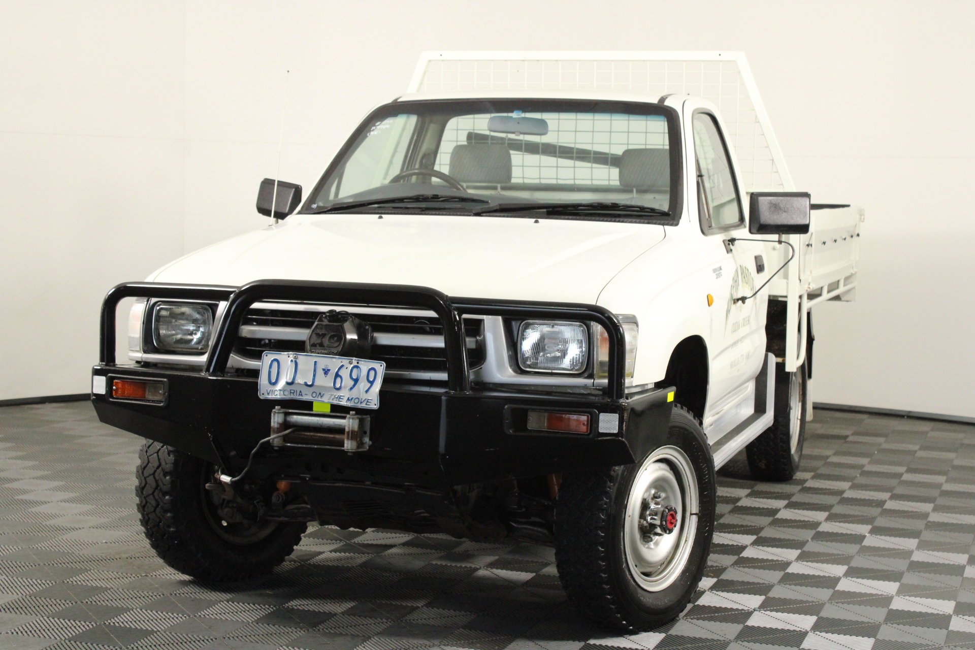 1999 maroon toyota hilux 4x4 pickup