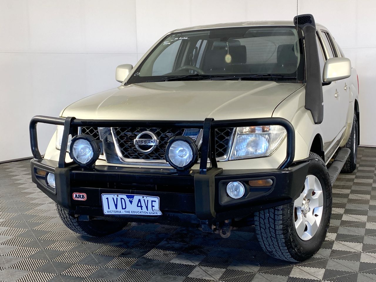 2011 Nissan Navara St (4x4) D40 Turbo Diesel Automatic Dual Cab Auction 