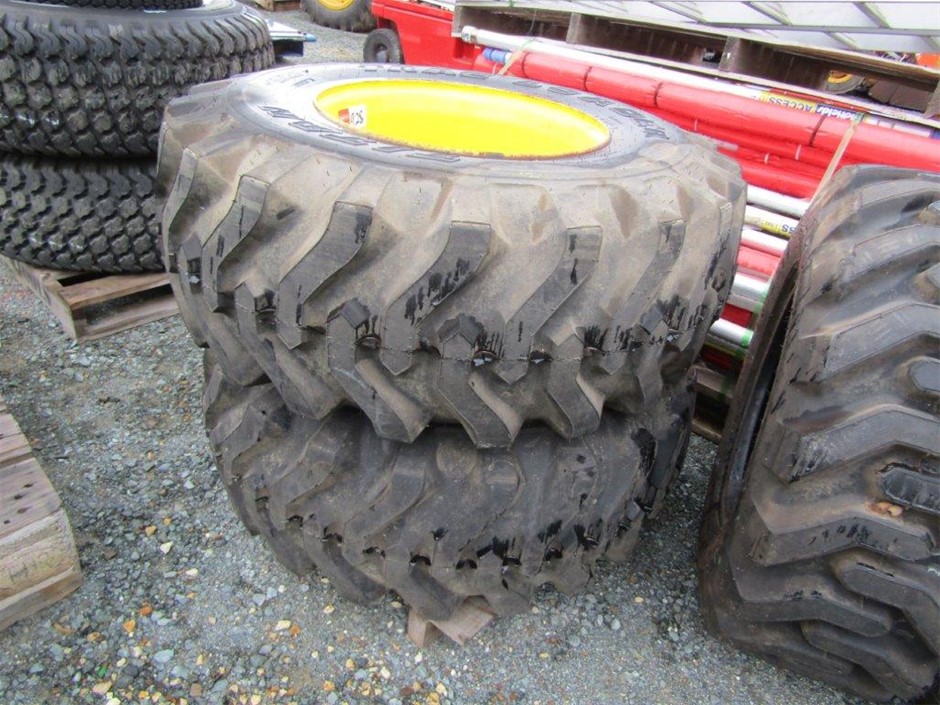 as new Takeoff Titan TracLoader tyres on JD 4310 Compact tractor rims