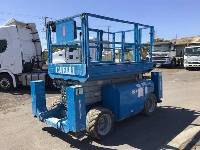 2003 Genie GS-3268RT Scissor Lift Auction (0029-3027035) | Grays Australia