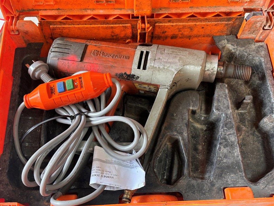 HUSQVARNA Core Drill, Model DM230 includes carry case Auction (0024
