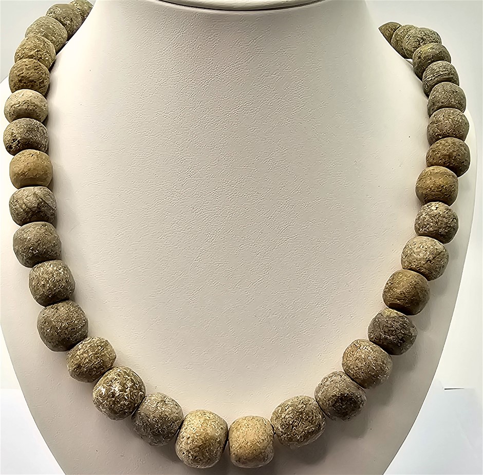 PREHISTORIC WOOLLY MAMMOTH BONE BEAD NECKLACE FROM THE LAST ICE AGE