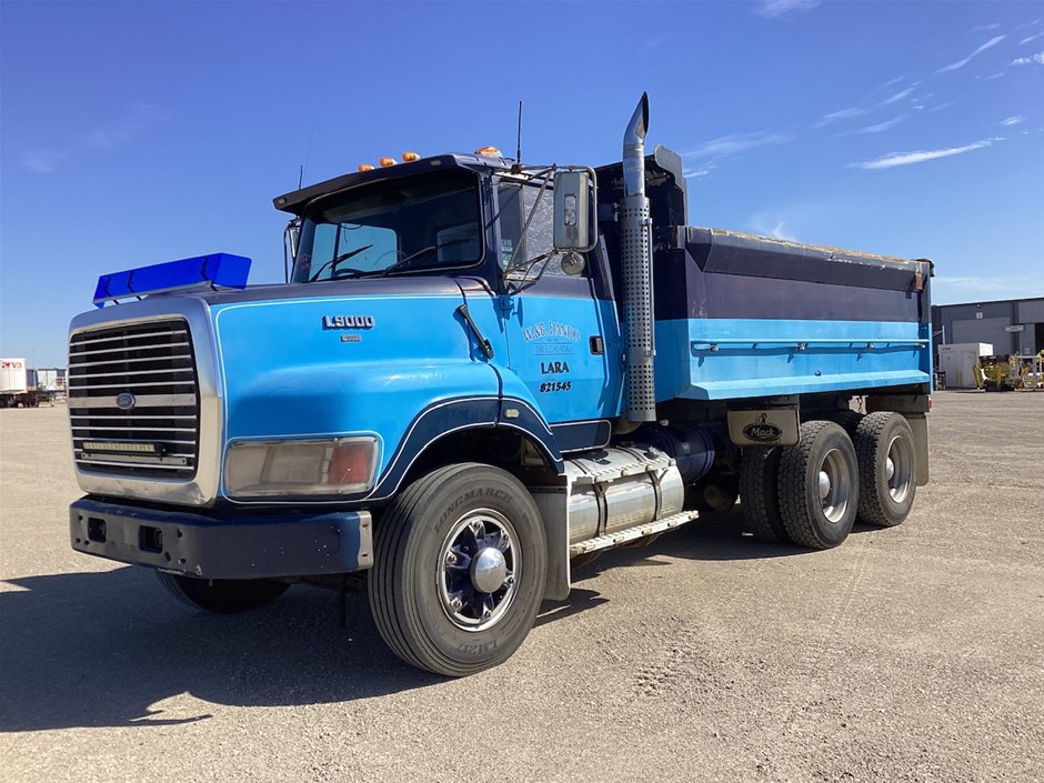 1995 FORD L9000  & 2014 UD MK 4 x 2 Curtainsider Rigid Truck
