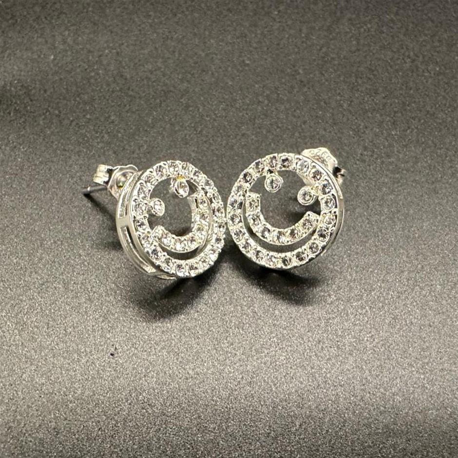 Designer Simulated Diamond Round Smiley Earrings in Silver