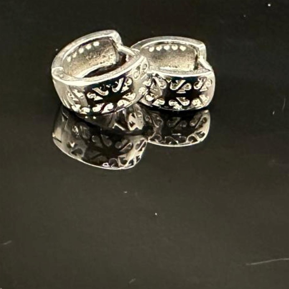 Designer Simulated Diamond Huggie Earrings in Silver