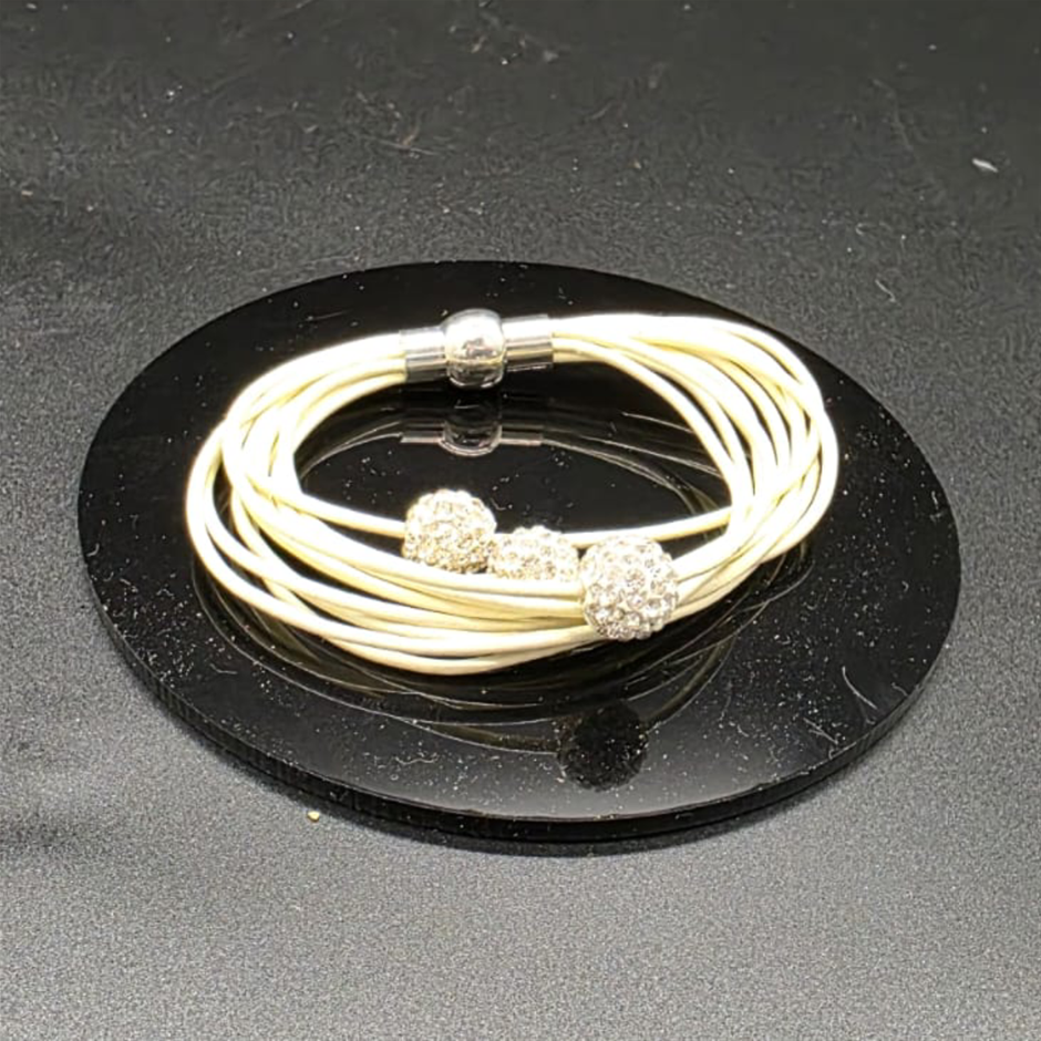 Designer Simulated Diamond Triple Ball Bracelet with Multi Cream Bands