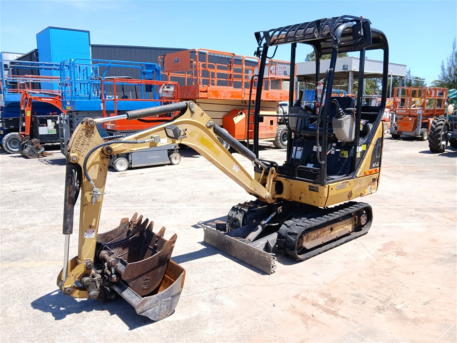 Caterpillar 3014C Mini Excavator and bucket attachments