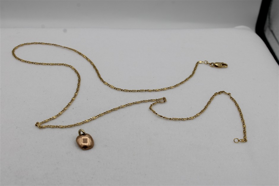 1 x Stamped 18ct Yellow Gold Chain & 1 x Acid Tested 9ct Button Pendant