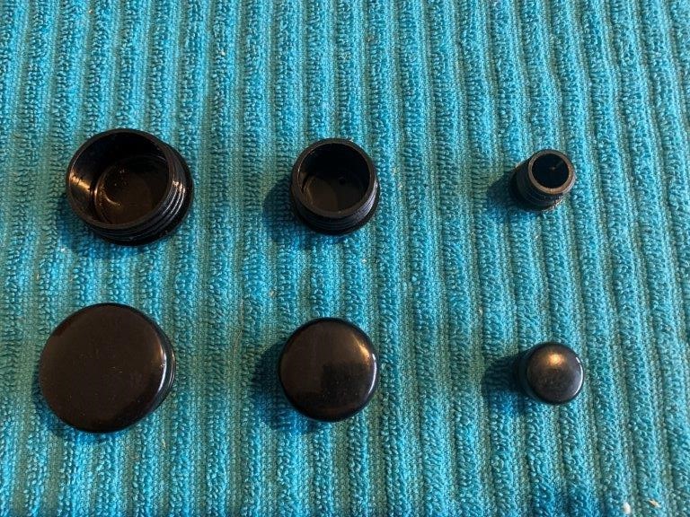 Large Quantity of Various Sized Round End Caps, Black