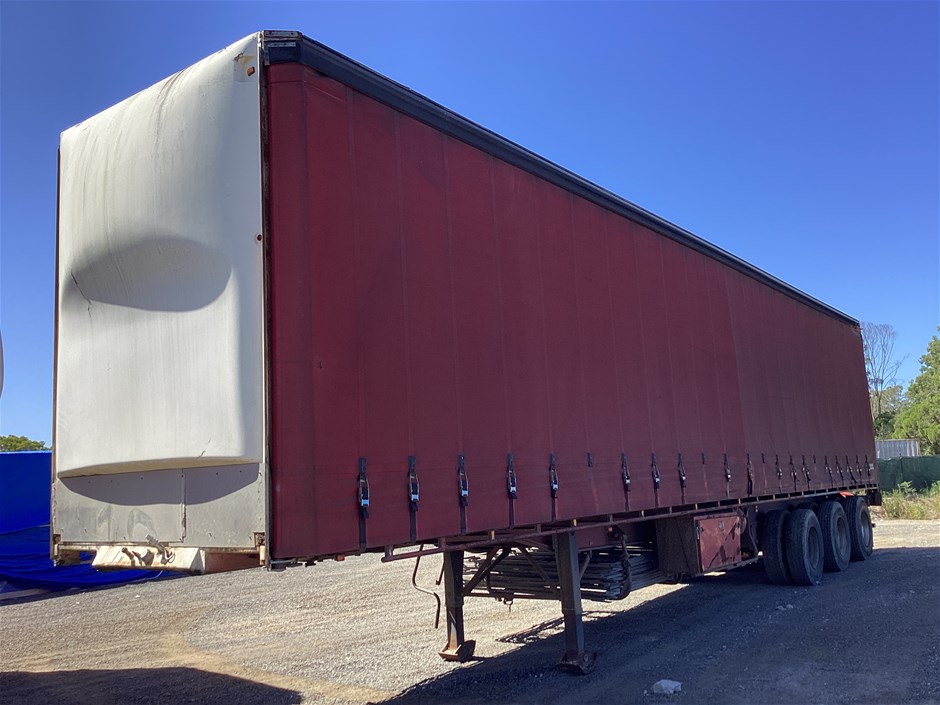 <p>1999 Krueger ST3 - 38 Triaxle Curtainsider Trailer</p>