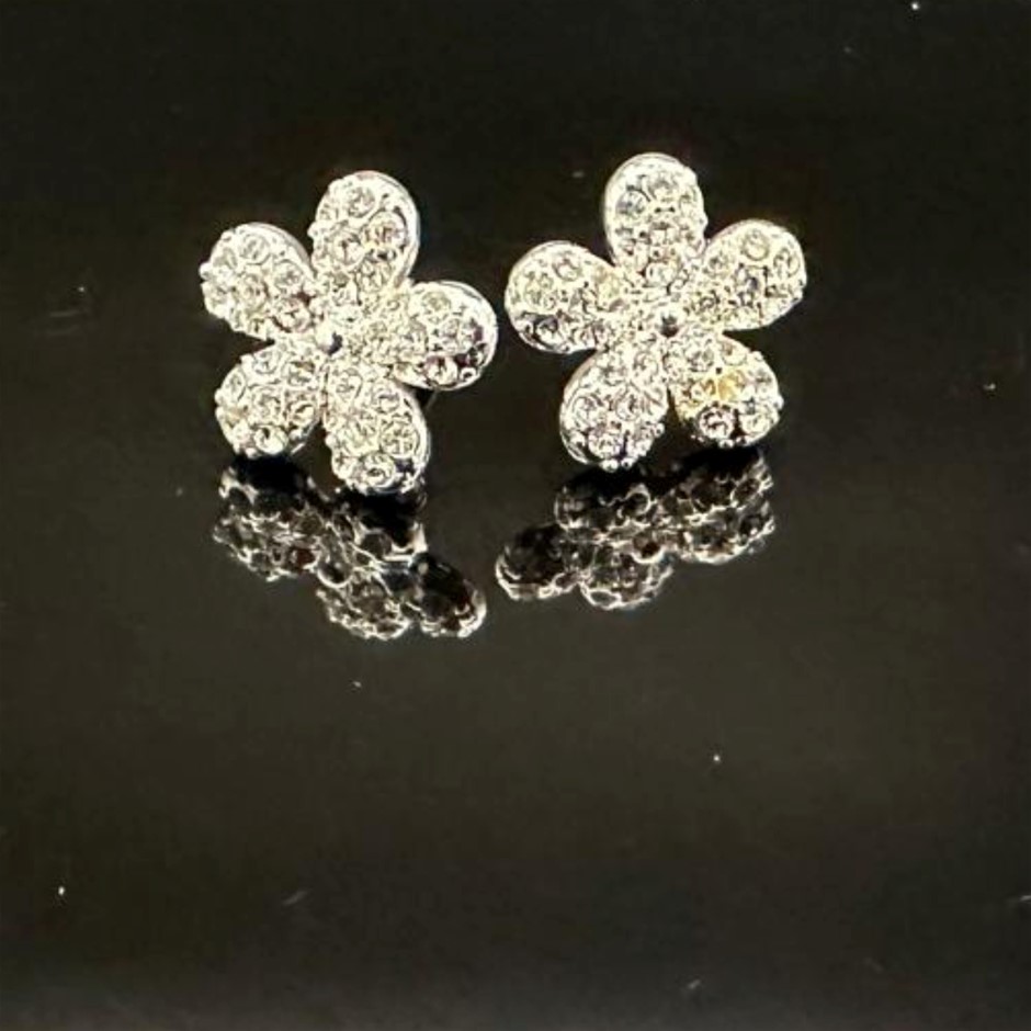 Designer Simulated Diamond Flower Earrings in Silver