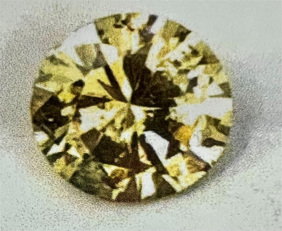 0.62 carat light greenish yellow valuation: $4,365