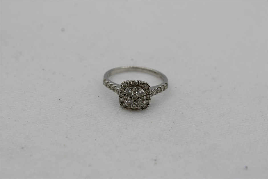 A Stamped 9ct Cushion Diamond Cluster Halo Ring