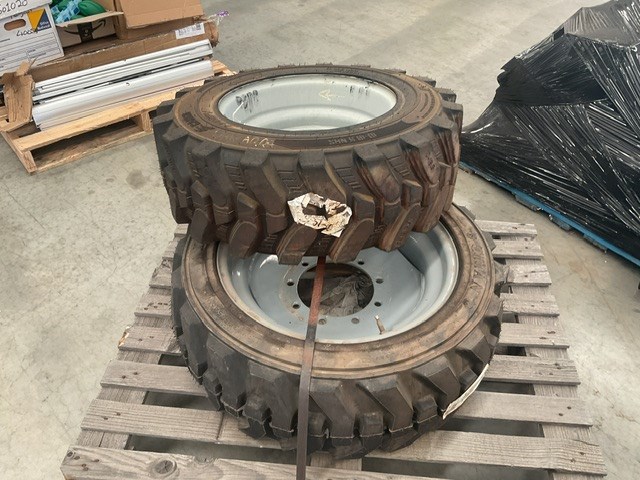 1 x 285/70-16.5 Tyre On 9 Stud Rim, 1 x 385-546 Tyre On 9 Stud Rim