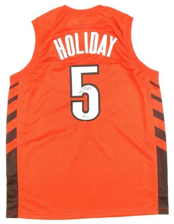 NBA CHAMPION JRUE HOLIDAY SIGNED JERSEY