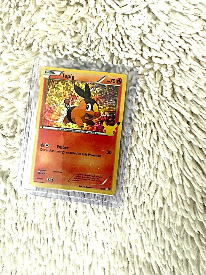 Tepig holo McDonald’s promo 13/25 moderately played.