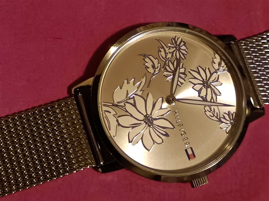 Tommy Hilfiger Ladies Watch and Pink Multi Storage hand wallet as new