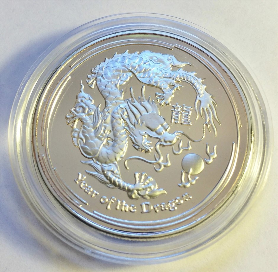 2012- 1 Ounce "Year Of The Dragon" Coin Finished in 999 Fine Silver in Caps