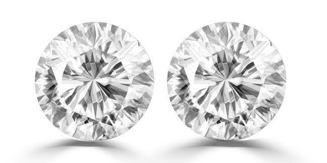 2 Carat round 2 white diamond each CVD Uncertified