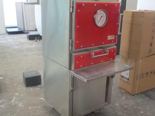 Inferno Wood Fire Pizza Oven on Storage Cabinet
