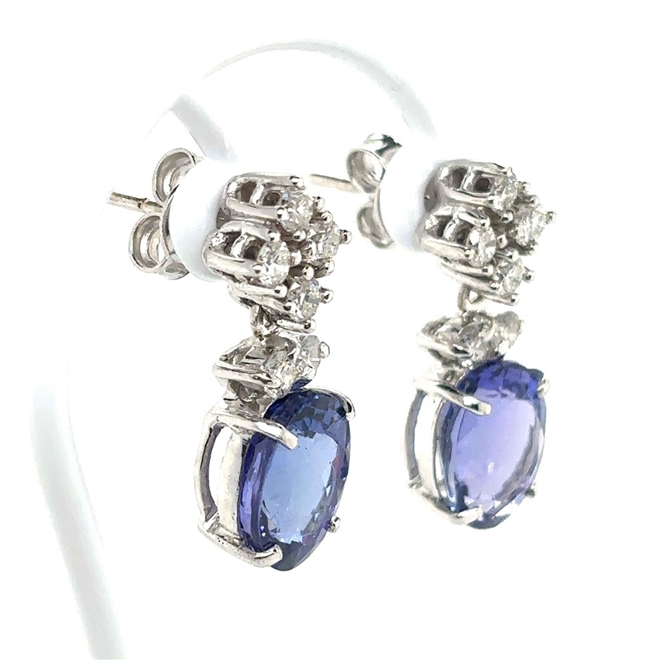 6.82ct 2 oval cut Tanzanites & 0.80ct 12 Stones Round VS-SI/F-G Dia Earring