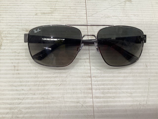 Pair Of Rayban Sunglasses