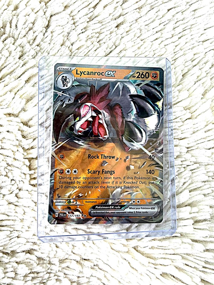 Lycanroc ex holo card showing fierce, battle-ready wolf pose.