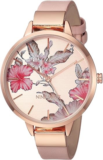 NINE WEST Women's Floral Dial Strap Watch. NB: Needs battery replacing and
