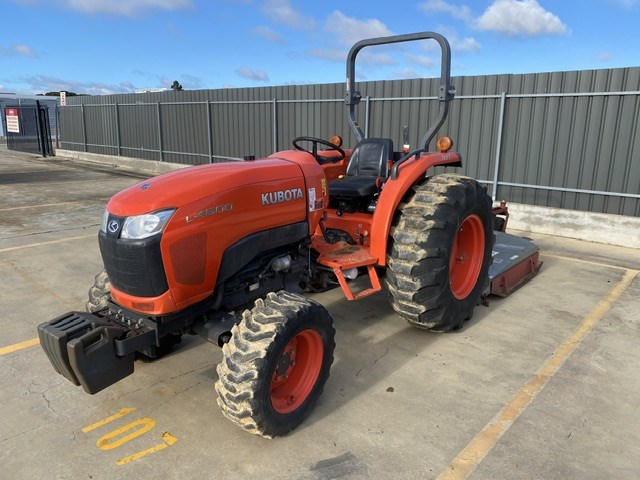 Kubota L4600 Tractor with Slasher Attachment
