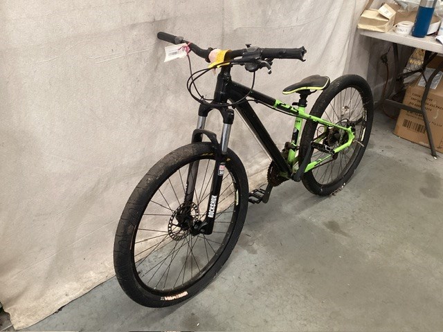 <p>Black/Green Mountain Bike</p>