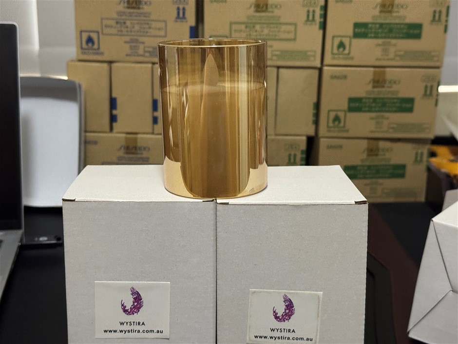 LED amber glass pillar candles with cream-coloured wax inserts