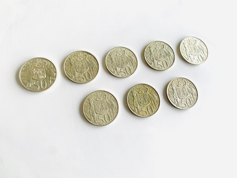 Lot of 8 1966 round 50 cent silver coins