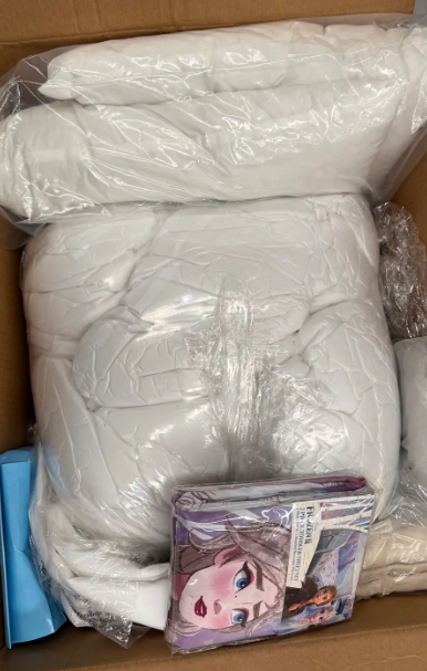 Box of Bedding incl: Doona, Covers etc. NB: Items may not be in original pa