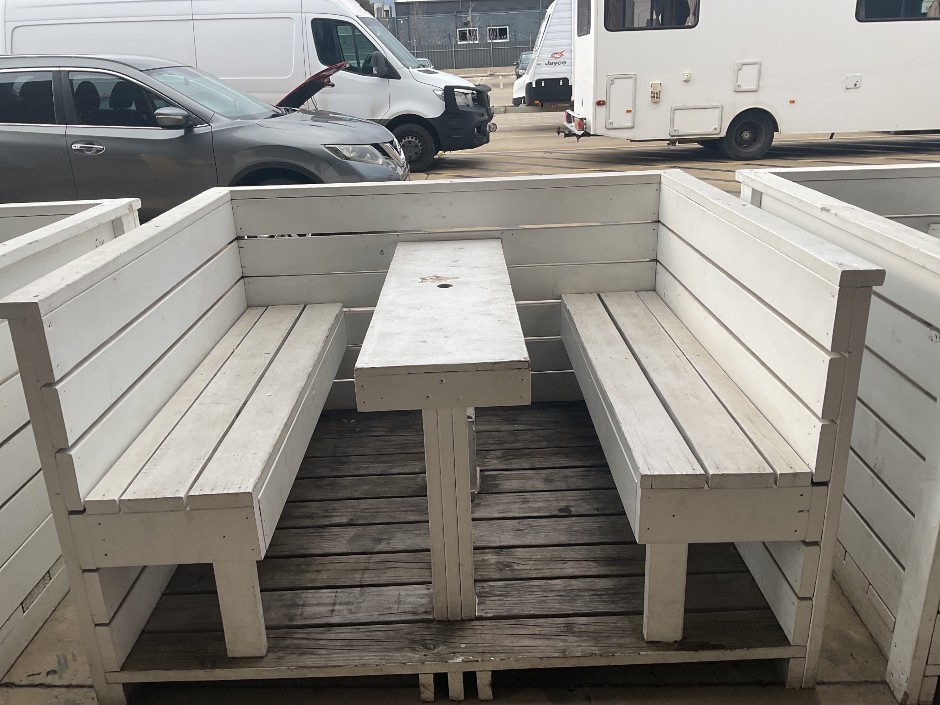 <p>Outdoor bench seat and table set</p>