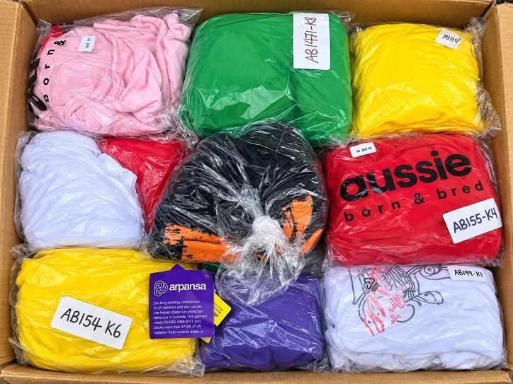 1 BOX of Assorted Aussie Born and Bred Singlets, Different Sizes and Colors