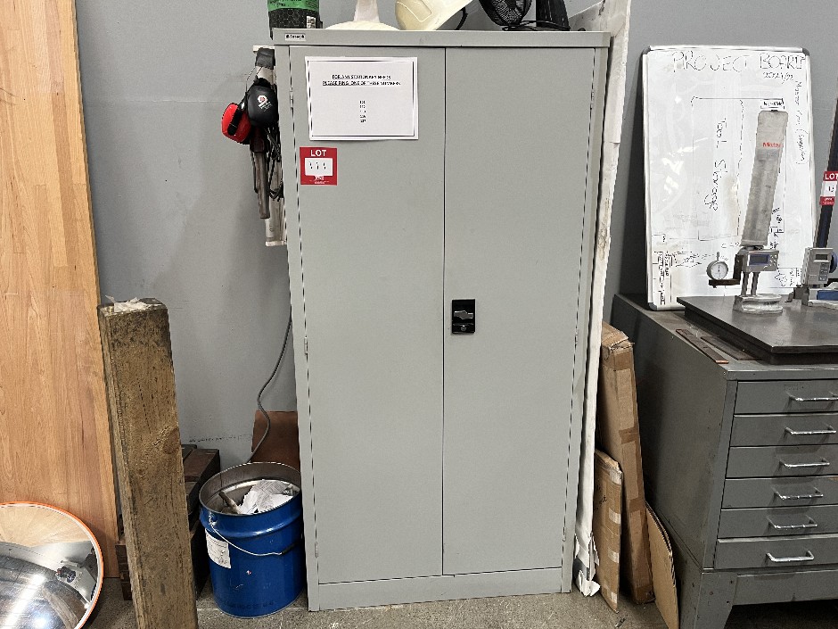 <p>2 Door Upright Storage Cabinet with Assorted Drill Bits and Contents</p>