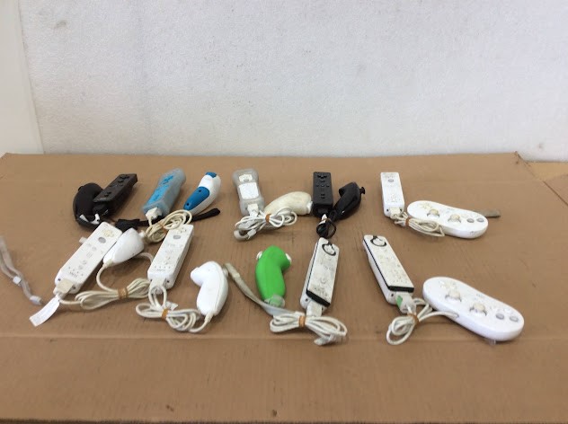 Nintendo Wii Remote Controllers and Nunchuk accessories (Lot of 9)