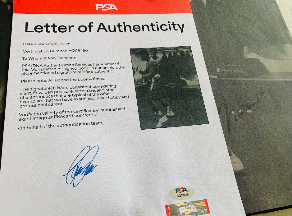 Muhammad Ali Signed book - PSA/DNA authentication