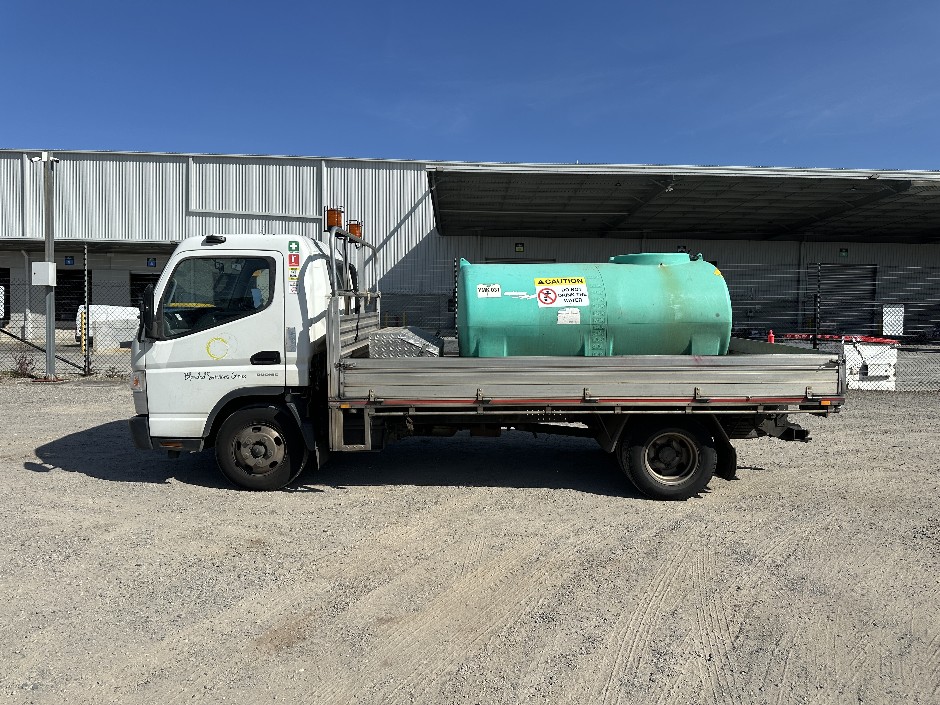2016 Mitsubishi Fuso Canter 615 4x2 Tray Truck With 3000L Water Tank