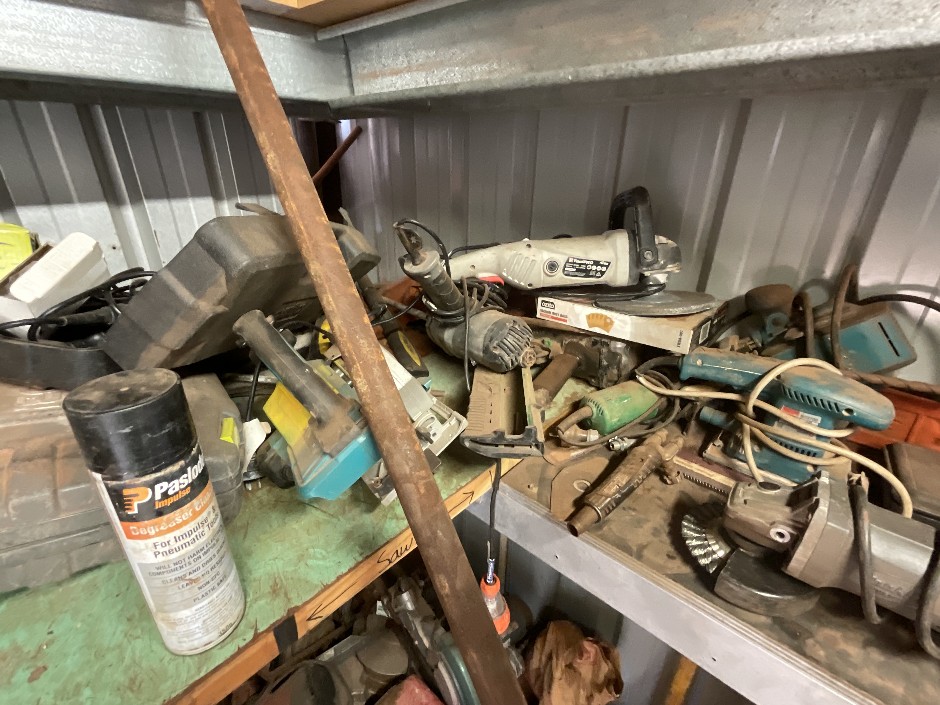 Shelf of Assorted Tools and Goods