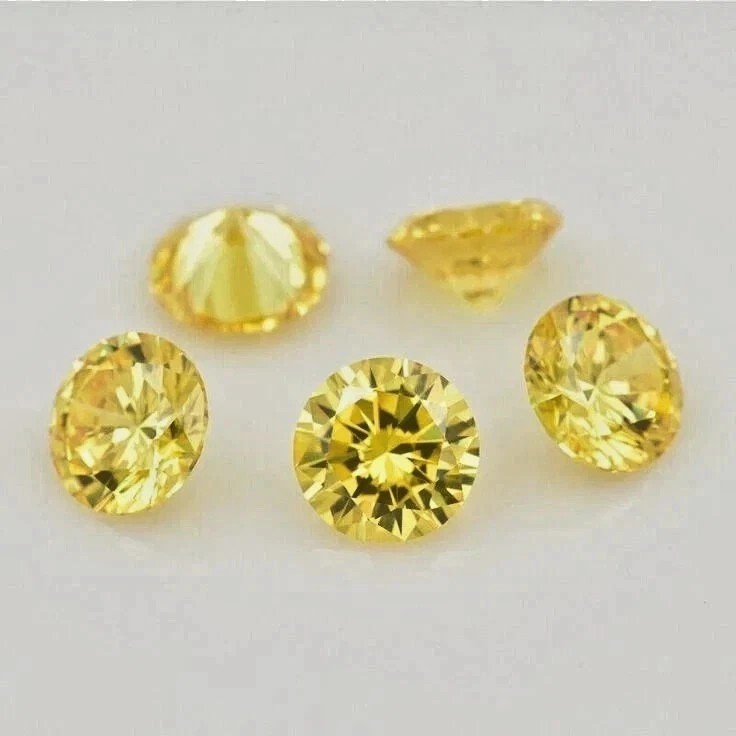 0.05 carat 5 round yellow diamond